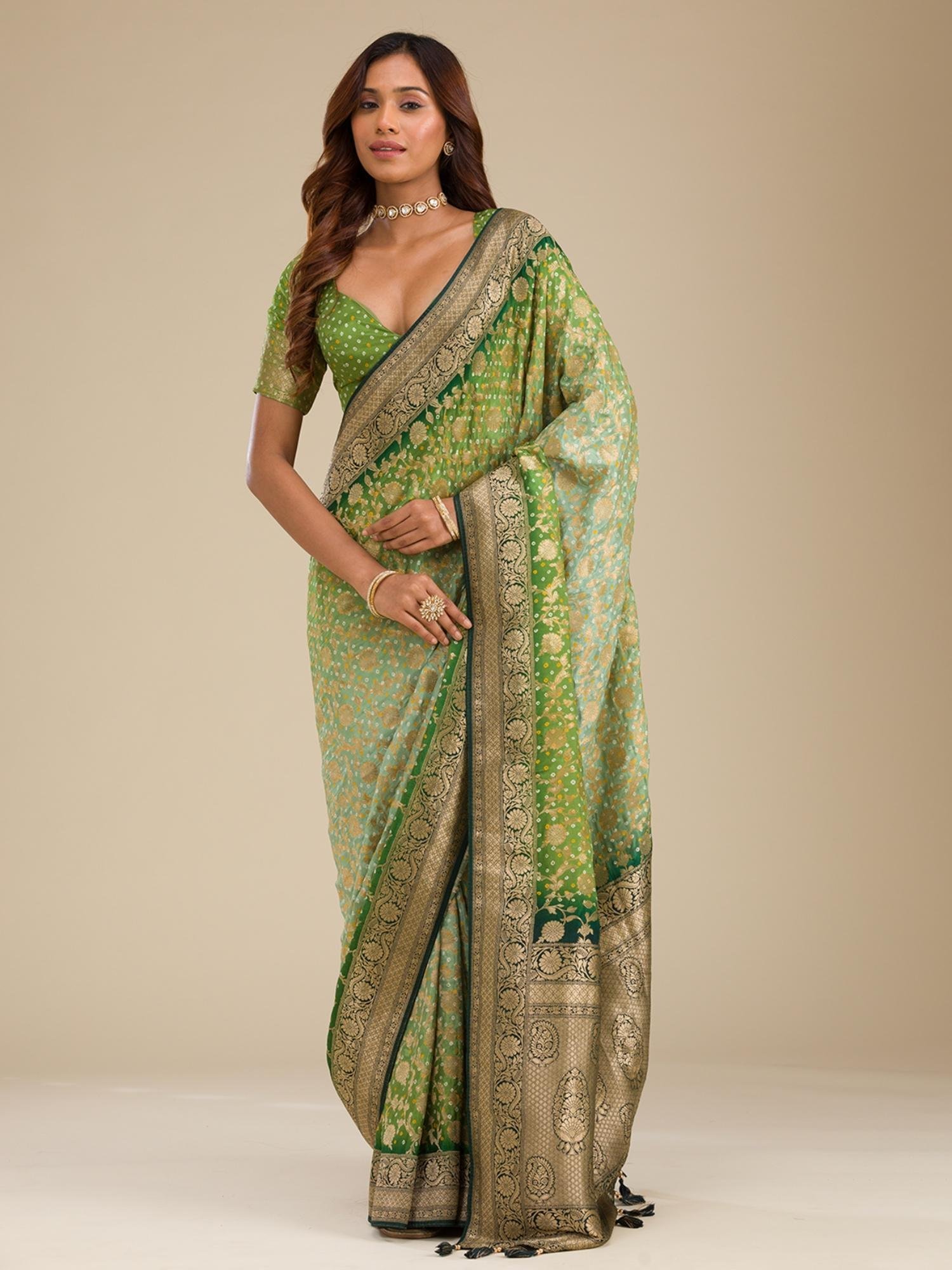 ad10b11SAUS0040410LEAFGREEN_1.jpg Leaf Green Zari Georgette Saree with Unstitched Blouse - Image 1